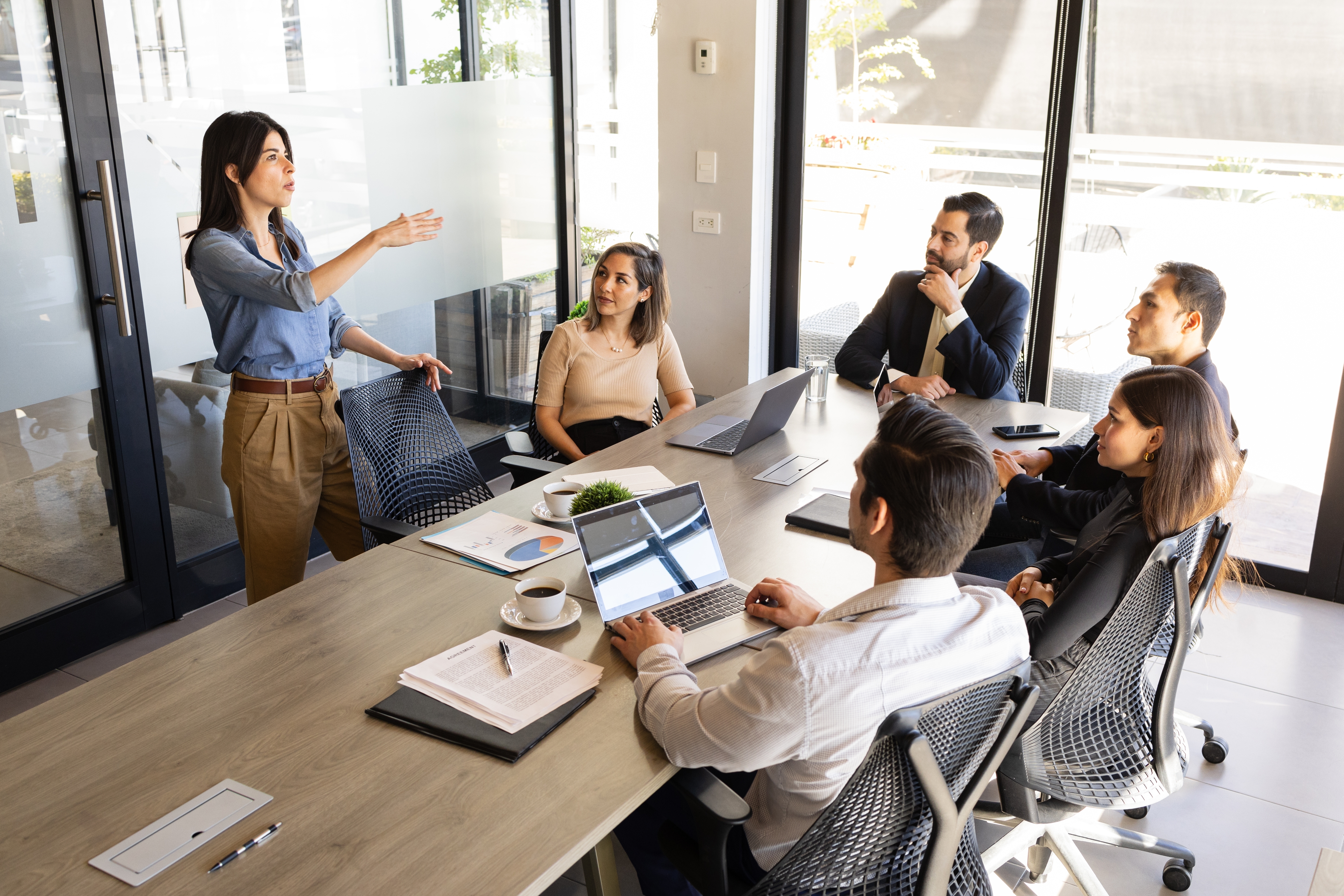 A team meeting in a light, airy room