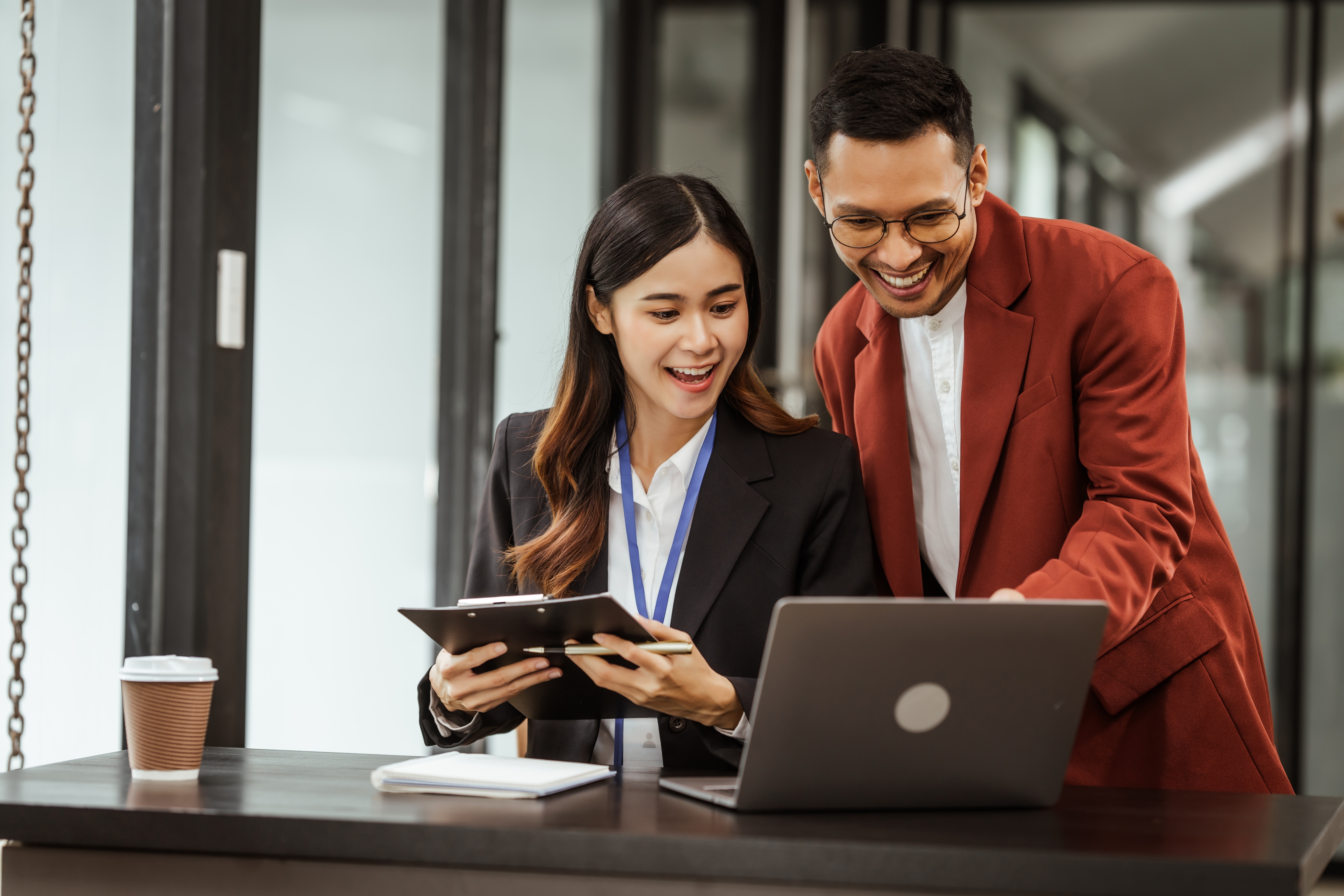 Two colleagues working in an office together